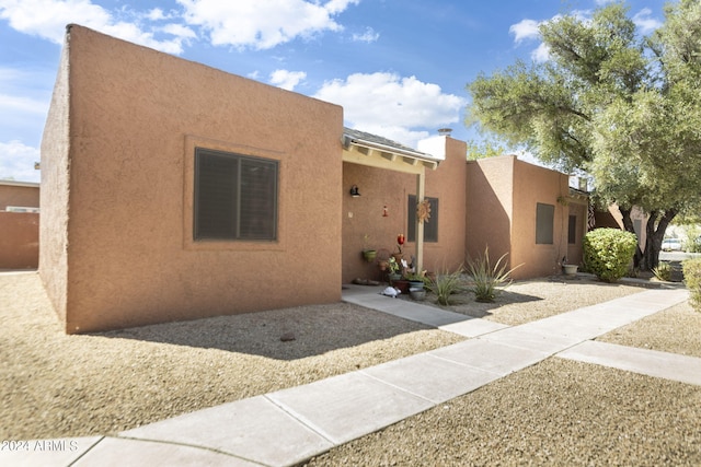 view of adobe home