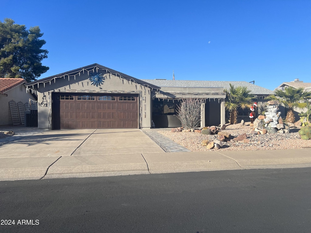 view of front of home with a garage