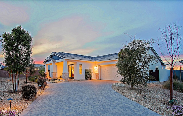 view of front of property featuring a garage