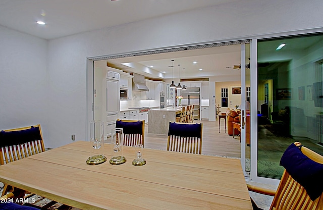 dining room featuring light hardwood / wood-style floors