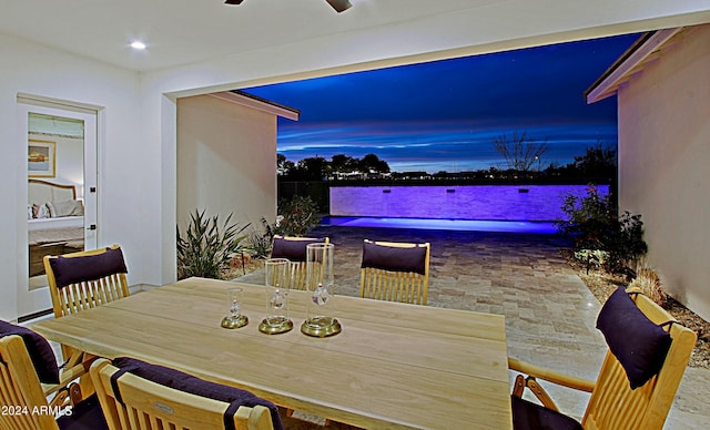 dining room featuring ceiling fan