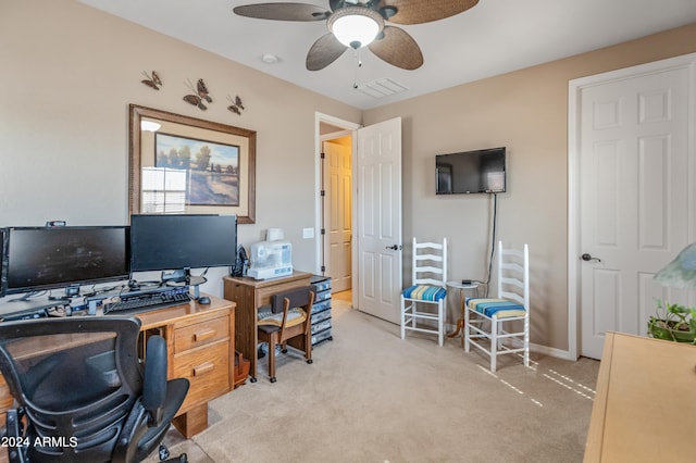 office featuring ceiling fan and light colored carpet