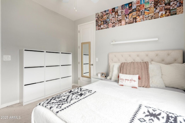 bedroom featuring carpet, a closet, and baseboards