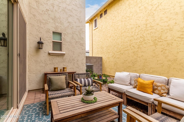 balcony featuring outdoor lounge area