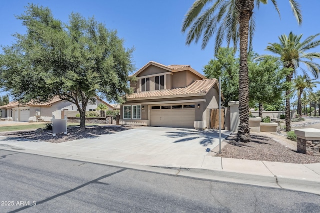 1311 N Congress Dr, Chandler, AZ 85226 - view of front of home featuring stucco siding, a tiled roof, driveway, and fence