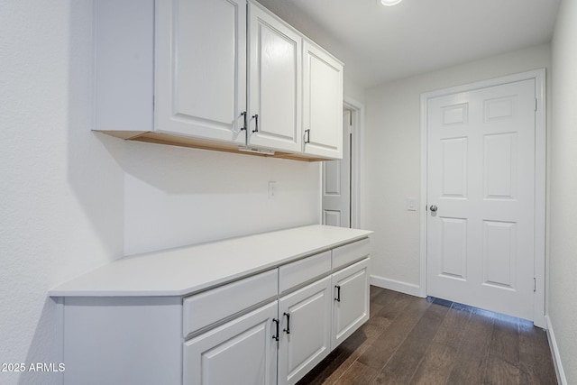 1311 N Congress Dr, Chandler, AZ 85226 - kitchen featuring dark wood-type flooring, white cabinets, baseboards, and light countertops