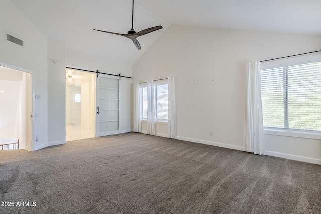 1311 N Congress Dr, Chandler, AZ 85226 - unfurnished bedroom featuring high vaulted ceiling, carpet floors, a barn door, and baseboards