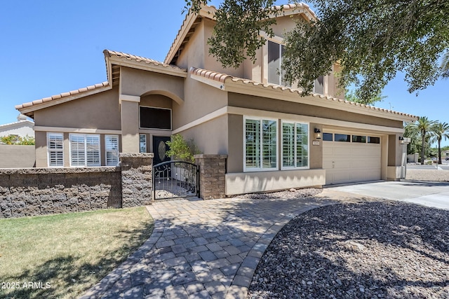 1311 N Congress Dr, Chandler, AZ 85226 - view of front of house featuring a gate, stucco siding, driveway, and a tiled roof