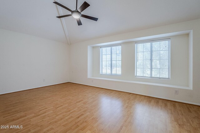 1311 N Congress Dr, Chandler, AZ 85226 - unfurnished room featuring wood finished floors, a ceiling fan, lofted ceiling, and baseboards