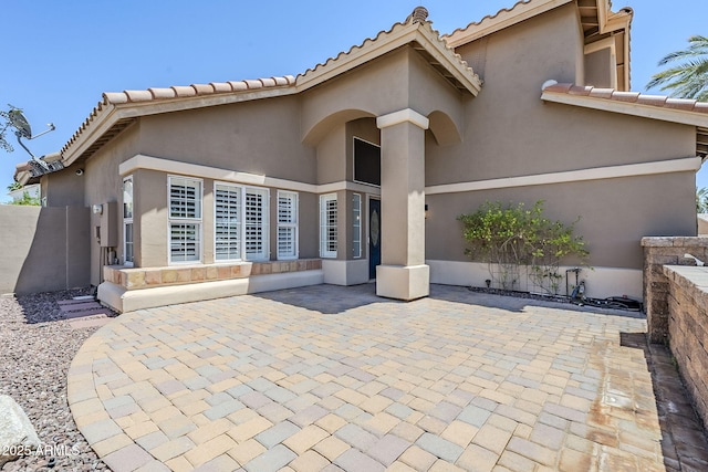1311 N Congress Dr, Chandler, AZ 85226 - view of front of home featuring a patio area, stucco siding, a tile roof, and fence
