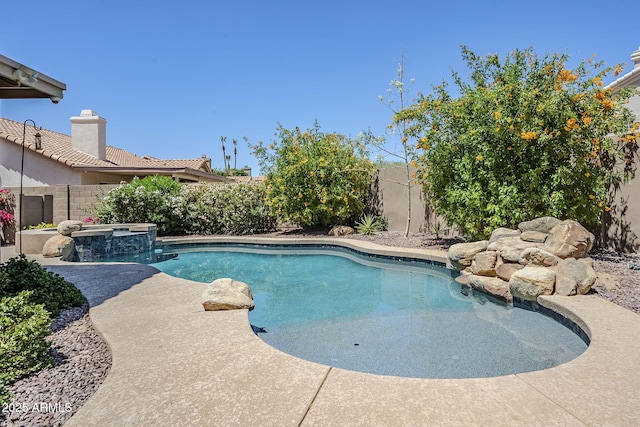 1311 N Congress Dr, Chandler, AZ 85226 - view of swimming pool featuring a fenced backyard and a pool with connected hot tub