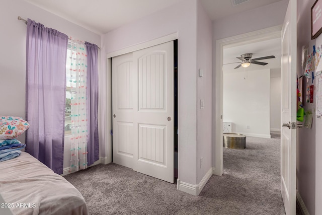 2540 N Stone Hill Rd, Buckeye, AZ 85396 - bedroom with baseboards, carpet flooring, visible vents, and a closet