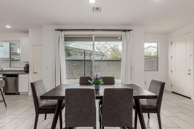 2540 N Stone Hill Rd, Buckeye, AZ 85396 - dining area featuring visible vents, recessed lighting, and light tile patterned flooring