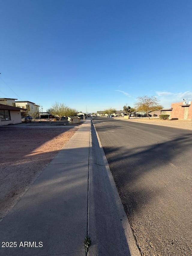 view of road featuring sidewalks