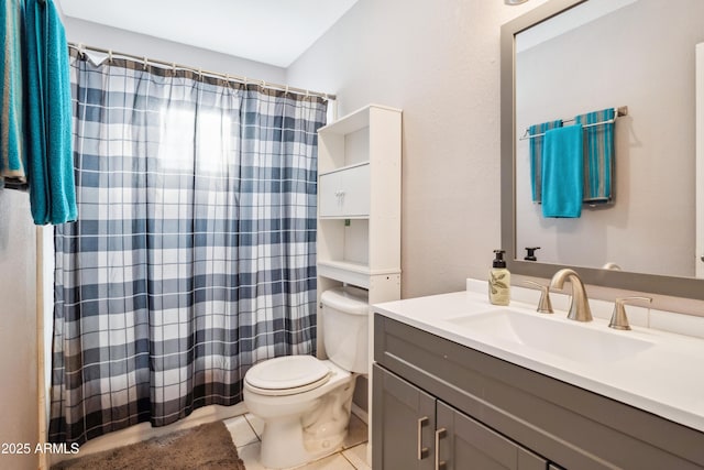 full bathroom with curtained shower, tile patterned flooring, toilet, and vanity