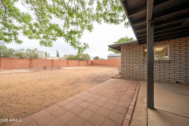exterior space featuring a fenced backyard