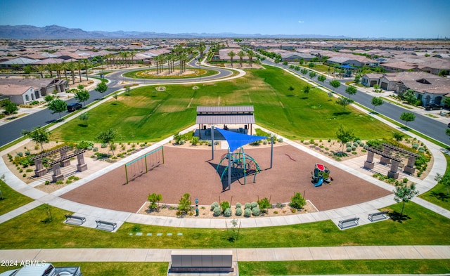 birds eye view of property with a mountain view