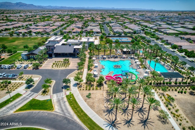 birds eye view of property featuring a mountain view