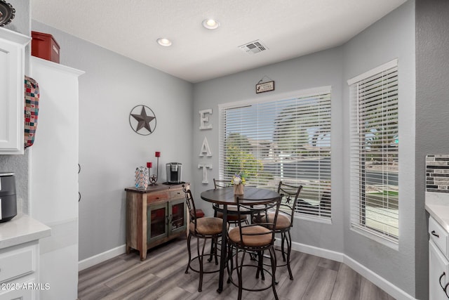 2910 S Olivewood, Mesa, AZ 85212 - dining space featuring light wood finished floors, recessed lighting, healthy amount of natural light, and baseboards