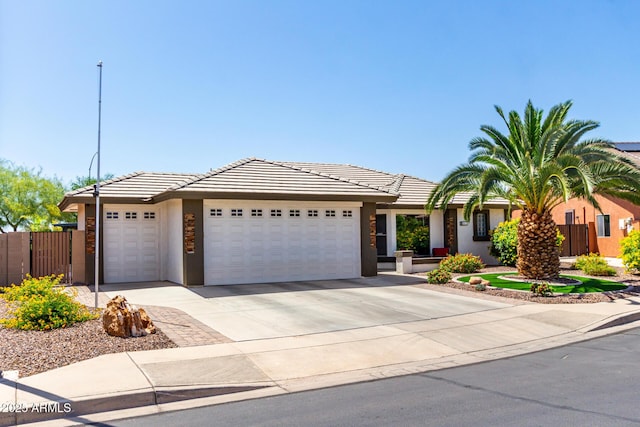 2910 S Olivewood, Mesa, AZ 85212 - view of front of home with a garage, driveway, stucco siding, and a tile roof