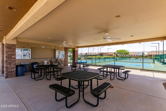 2910 S Olivewood, Mesa, AZ 85212 - view of patio / terrace featuring a tennis court, ceiling fan, and fence