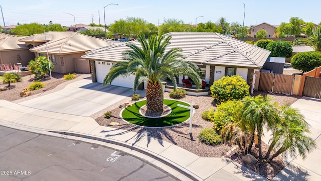 2910 S Olivewood, Mesa, AZ 85212 - ranch-style home with a gate, driveway, a tiled roof, and fence