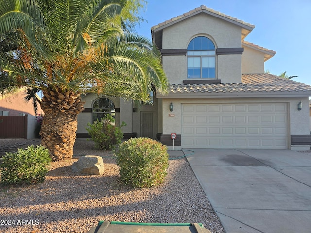 view of front of home with a garage