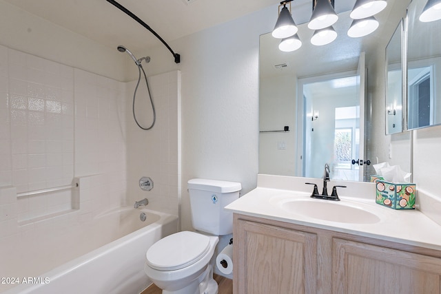 full bathroom featuring vanity, toilet, and  shower combination