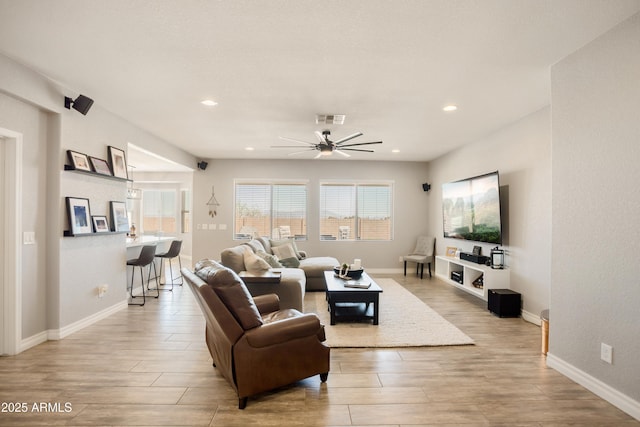 3523 W Rhapsody Dr, Sierra Vista, AZ 85650 - living area with ceiling fan, visible vents, a wealth of natural light, and light wood-style floors