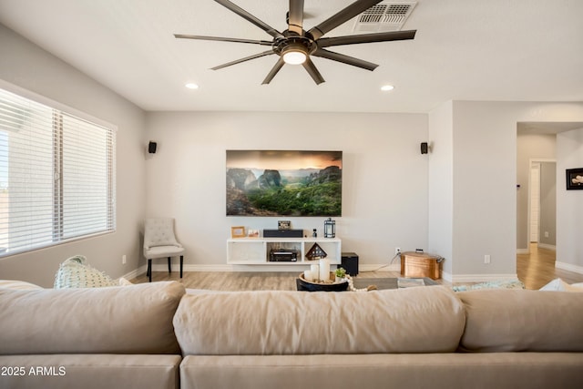 3523 W Rhapsody Dr, Sierra Vista, AZ 85650 - living room featuring a ceiling fan, visible vents, wood finished floors, baseboards, and recessed lighting