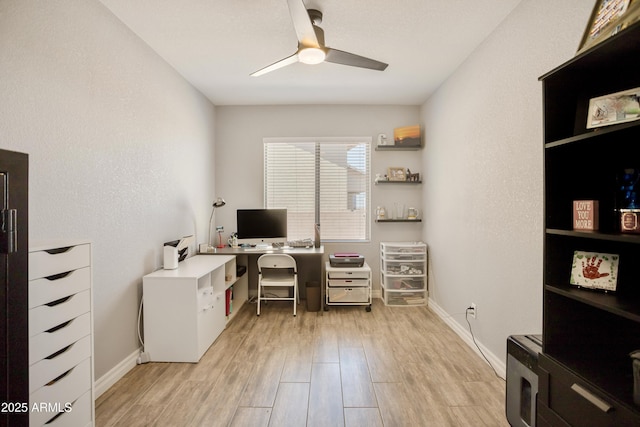 3523 W Rhapsody Dr, Sierra Vista, AZ 85650 - office area featuring baseboards, ceiling fan, and light wood finished floors