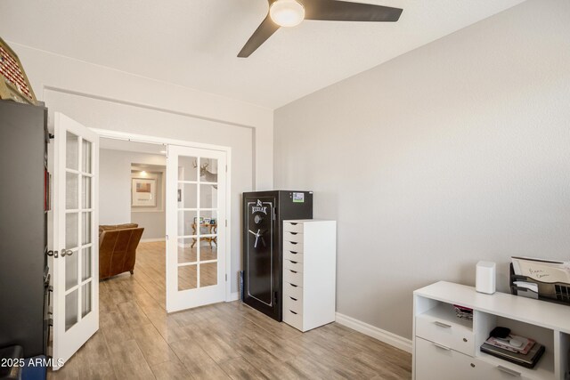 3523 W Rhapsody Dr, Sierra Vista, AZ 85650 - office featuring french doors, light wood-style floors, ceiling fan, and baseboards