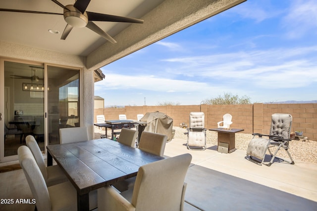3523 W Rhapsody Dr, Sierra Vista, AZ 85650 - view of patio / terrace with grilling area, a ceiling fan, outdoor dining area, and a fenced backyard