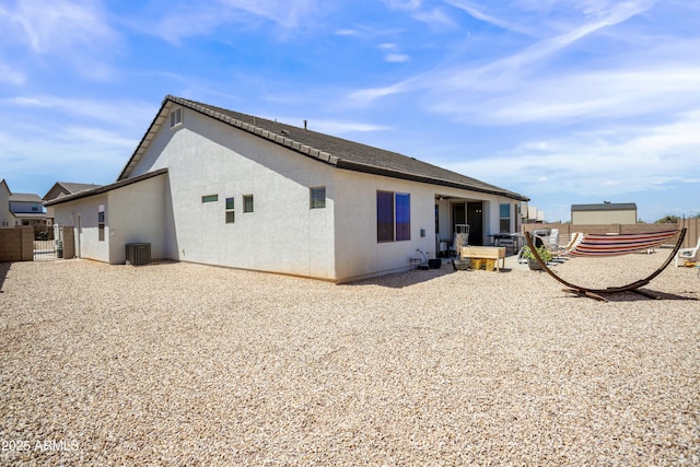 3523 W Rhapsody Dr, Sierra Vista, AZ 85650 - back of property featuring fence, stucco siding, and cooling unit