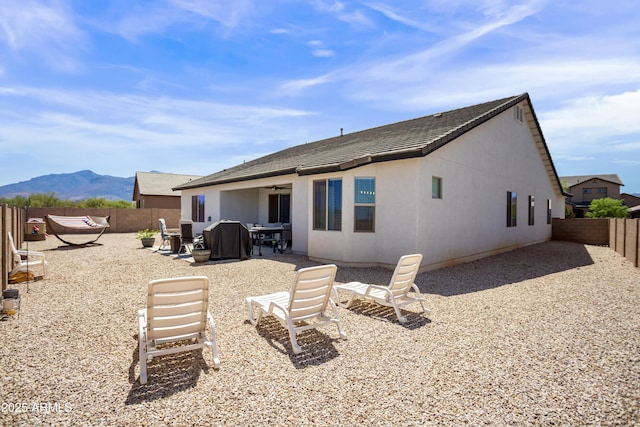 3523 W Rhapsody Dr, Sierra Vista, AZ 85650 - rear view of house featuring a patio, a fenced backyard, ceiling fan, and a mountain view