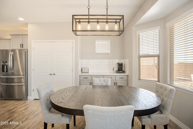 3523 W Rhapsody Dr, Sierra Vista, AZ 85650 - dining area with recessed lighting, baseboards, and light wood-style floors