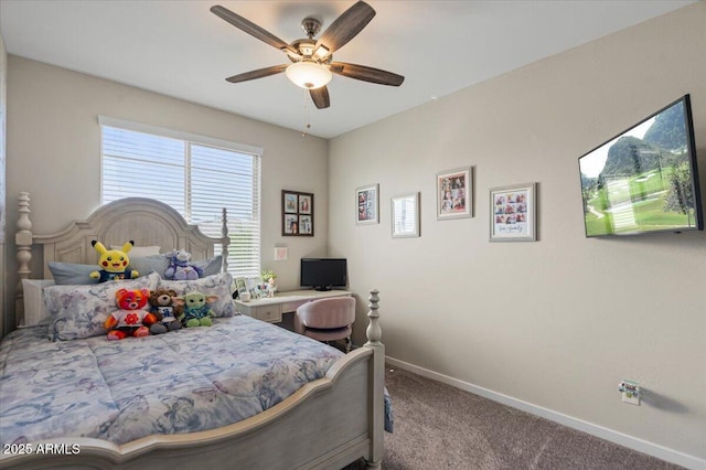 carpeted bedroom featuring baseboards and ceiling fan