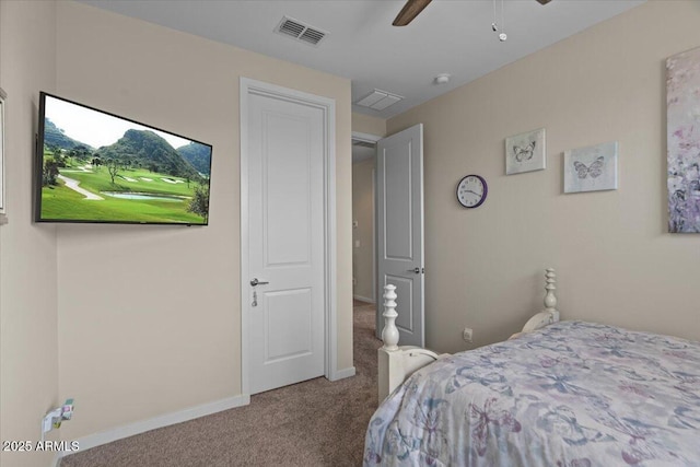 carpeted bedroom featuring baseboards and ceiling fan