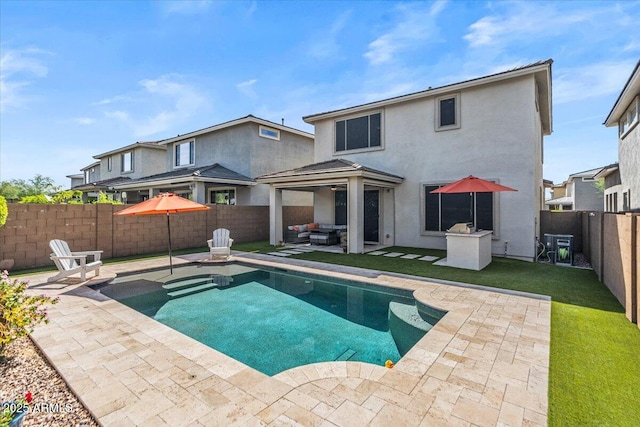 view of pool with a patio, a fenced backyard, and an outdoor hangout area