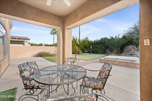 view of patio with ceiling fan