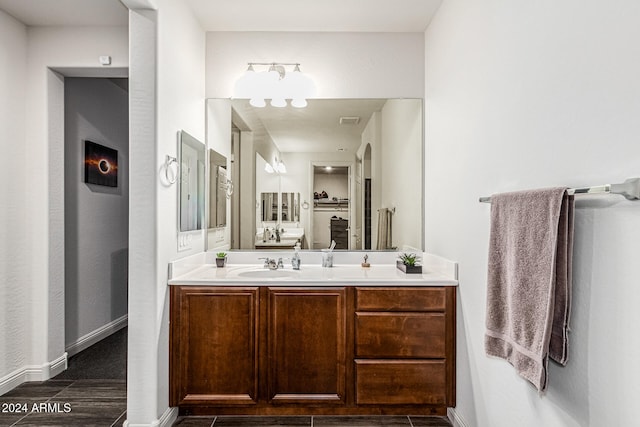 bathroom featuring hardwood / wood-style floors and vanity