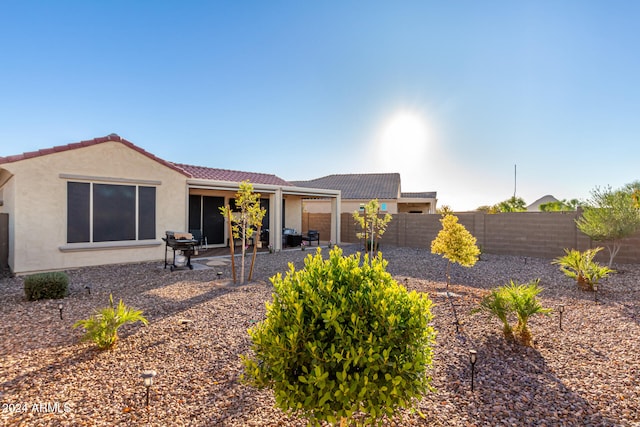 back of house featuring a patio