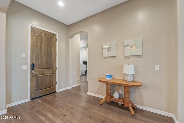 entrance foyer with hardwood / wood-style floors