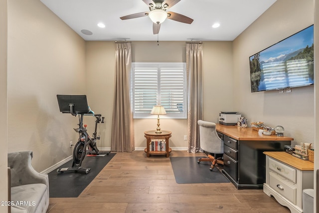 office area with hardwood / wood-style floors and ceiling fan