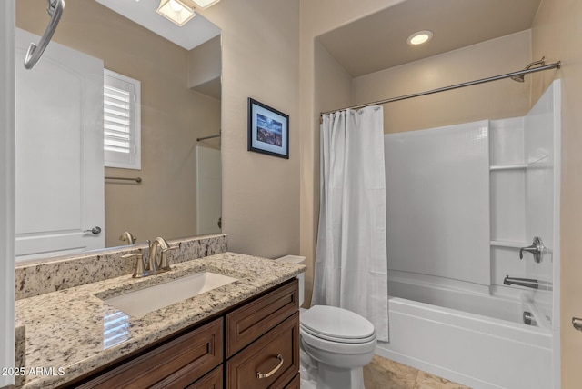 full bathroom with tile patterned floors, vanity, shower / tub combo, and toilet