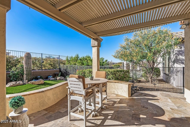 view of patio featuring a pergola