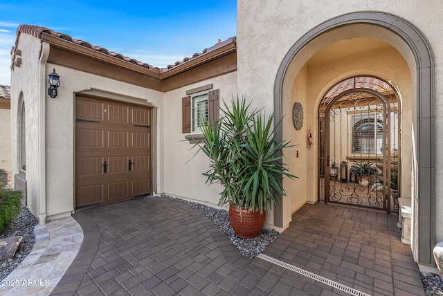 property entrance with a garage