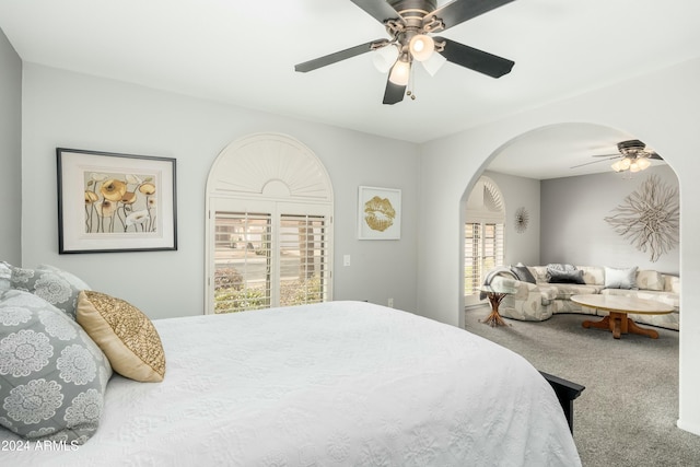 bedroom featuring ceiling fan and carpet floors