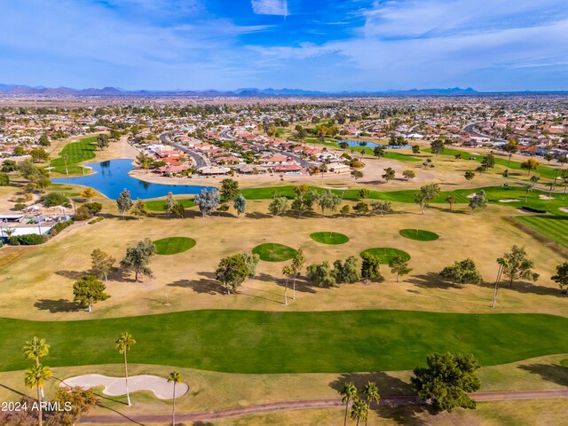 aerial view featuring a water and mountain view