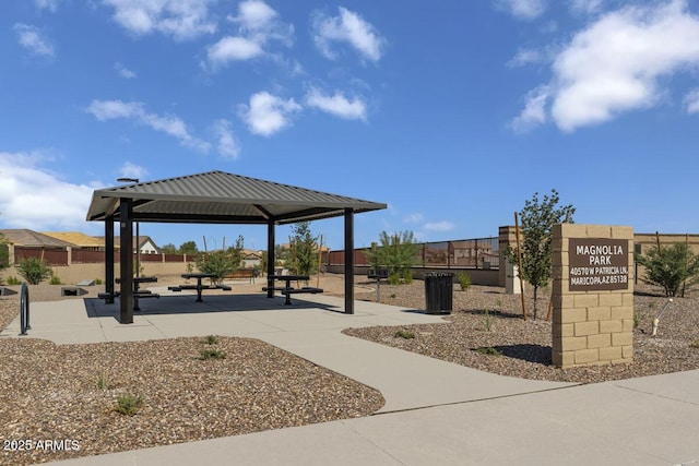 view of property's community featuring a gazebo and fence